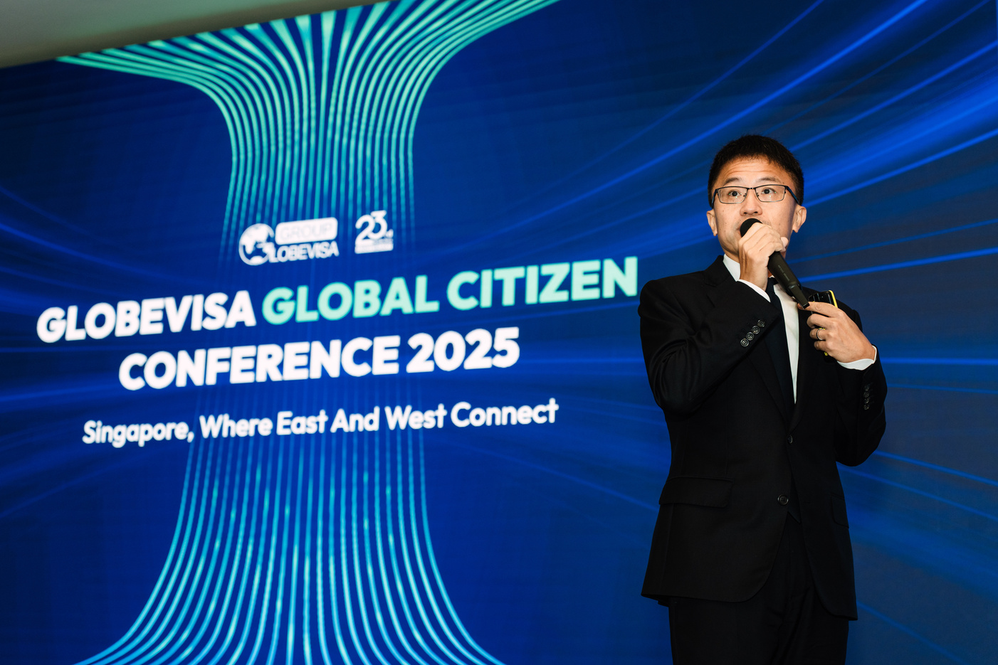 Henry Fan addresses the conference in Singapore.